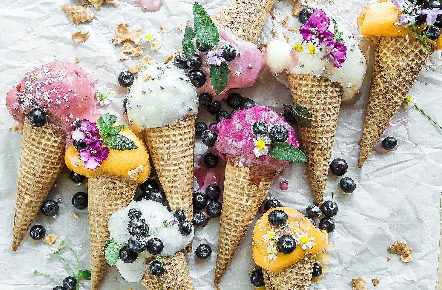 Sorbets of all colours and description sprinkled with blueberries.